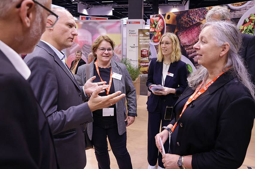 Fachgespräch auf der Anuga am Gemeinschaftsstand der Ernährungsindustrie